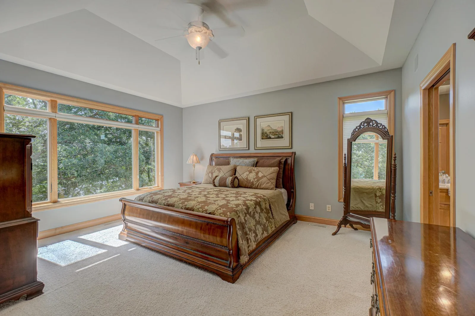 The main level features a generous master suite complete with a luxurious walk-in shower and a jacuzzi bathtub private haven for rest and rejuvenation.