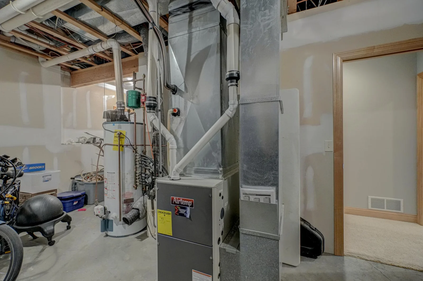 The utility room is already plumbed and ready for a third full bathroom, offering flexibility for future upgrades.