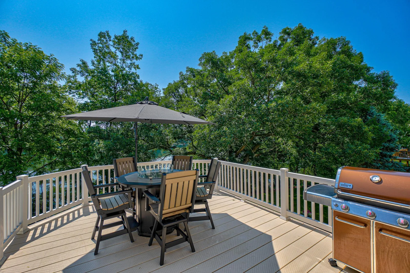 Whether you’re watching a sunrise shimmer over the water or enjoying the golden glow of sunset from your deck, this home invites you to embrace every season.