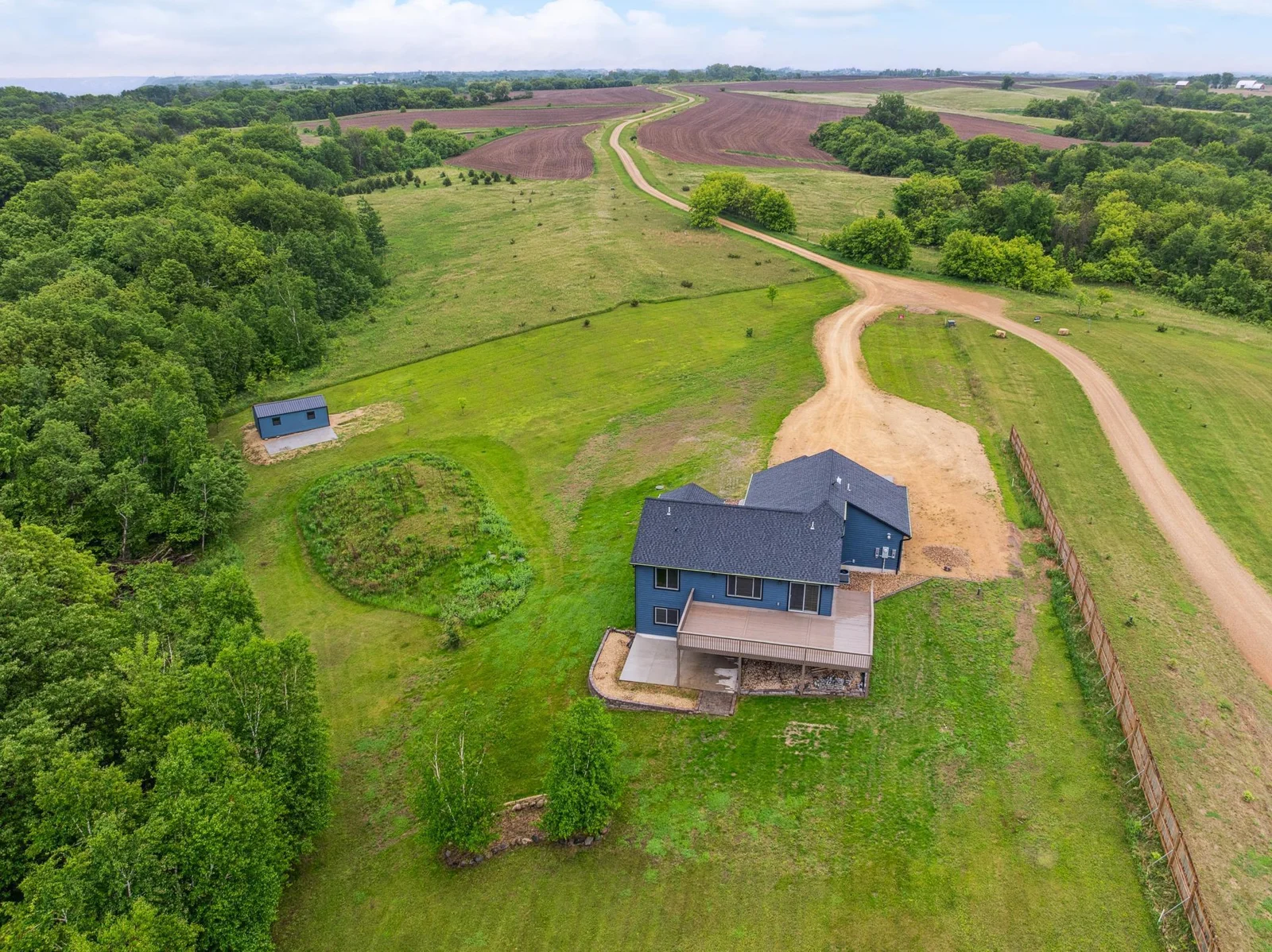 From the driveway to the bluffs edge, this property is a showstopper.