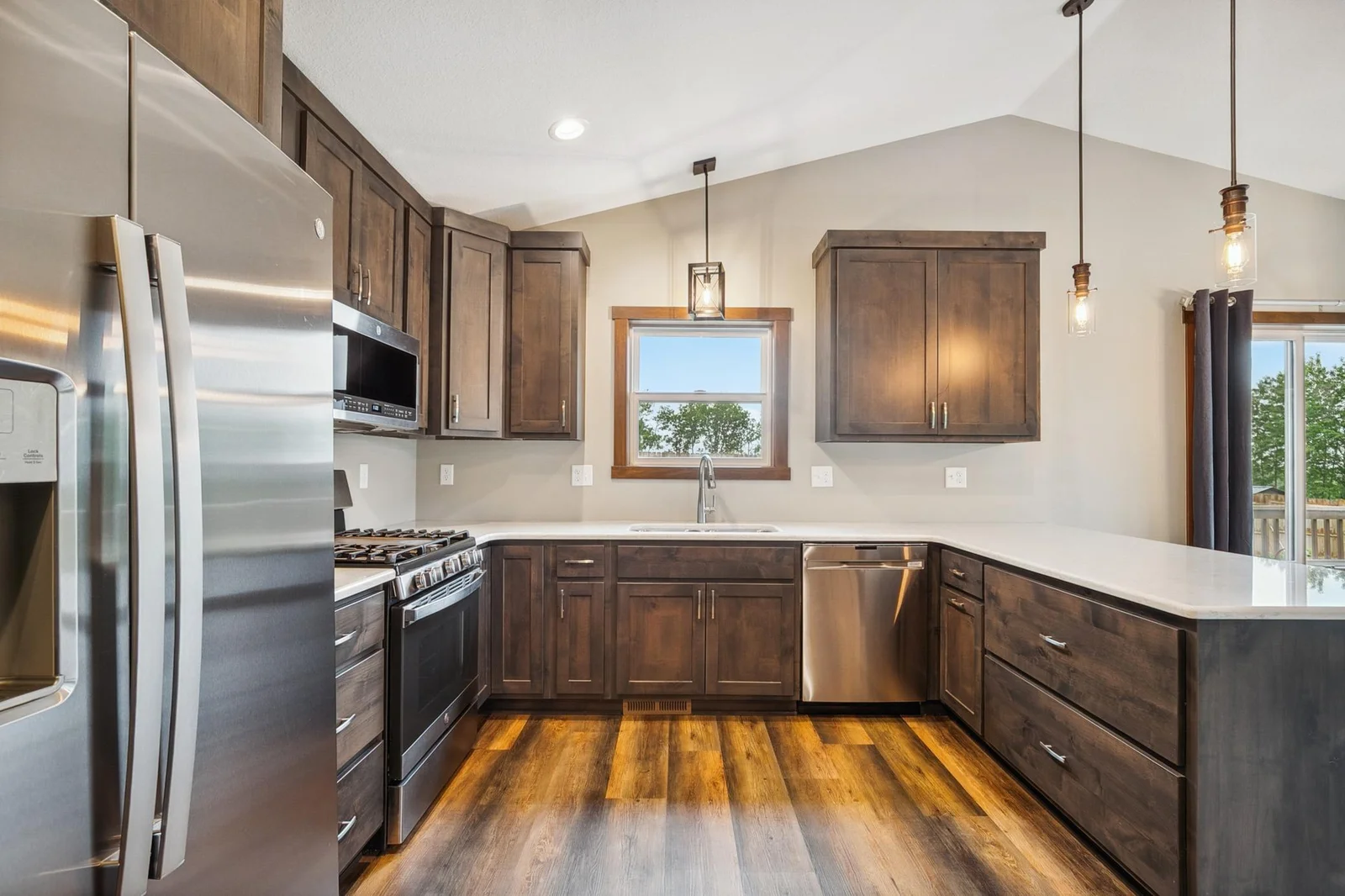 A chefs dream with high-end appliances and endless counter space.