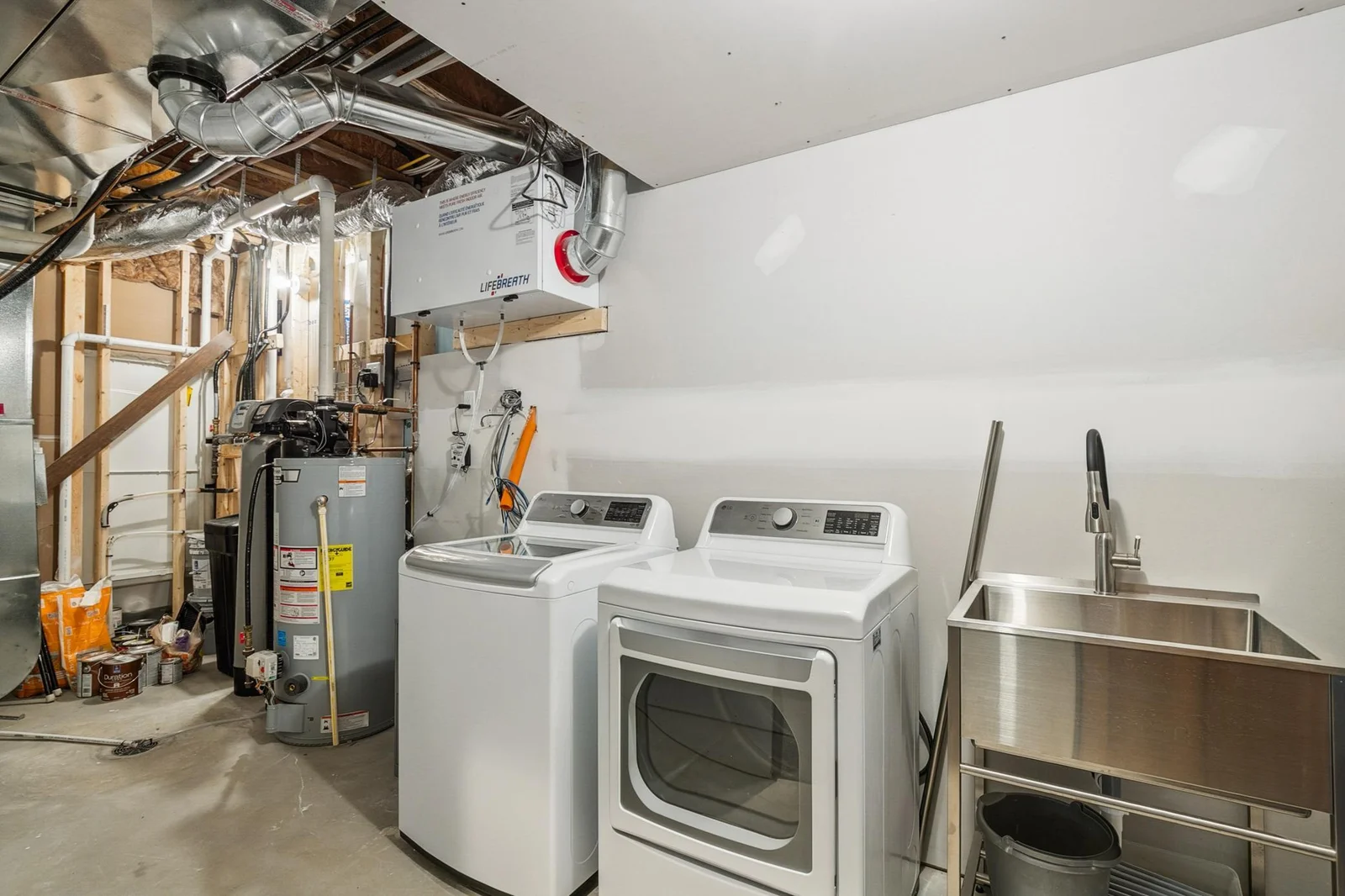 A spacious, organized utility room designed for efficiency and convenience in everyday living.