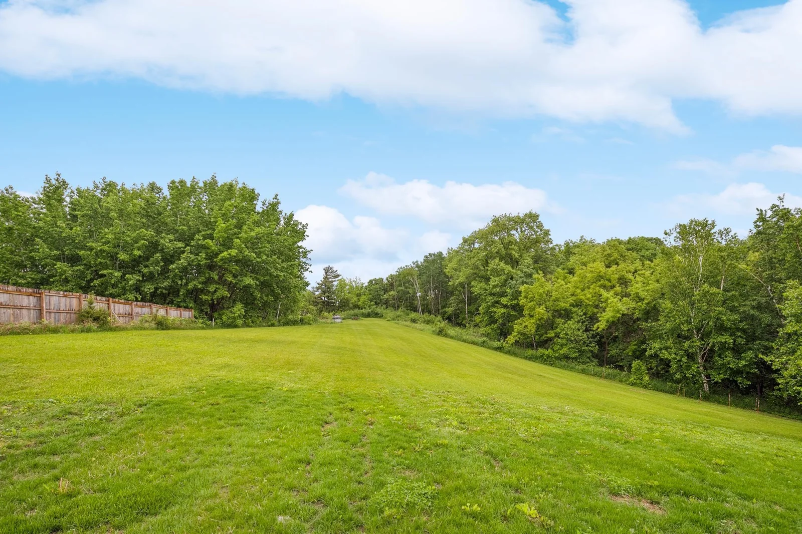 From above, the full beauty of this 3.3-acre blufftop retreat comes to life—privacy, nature, and unmatched elevation.