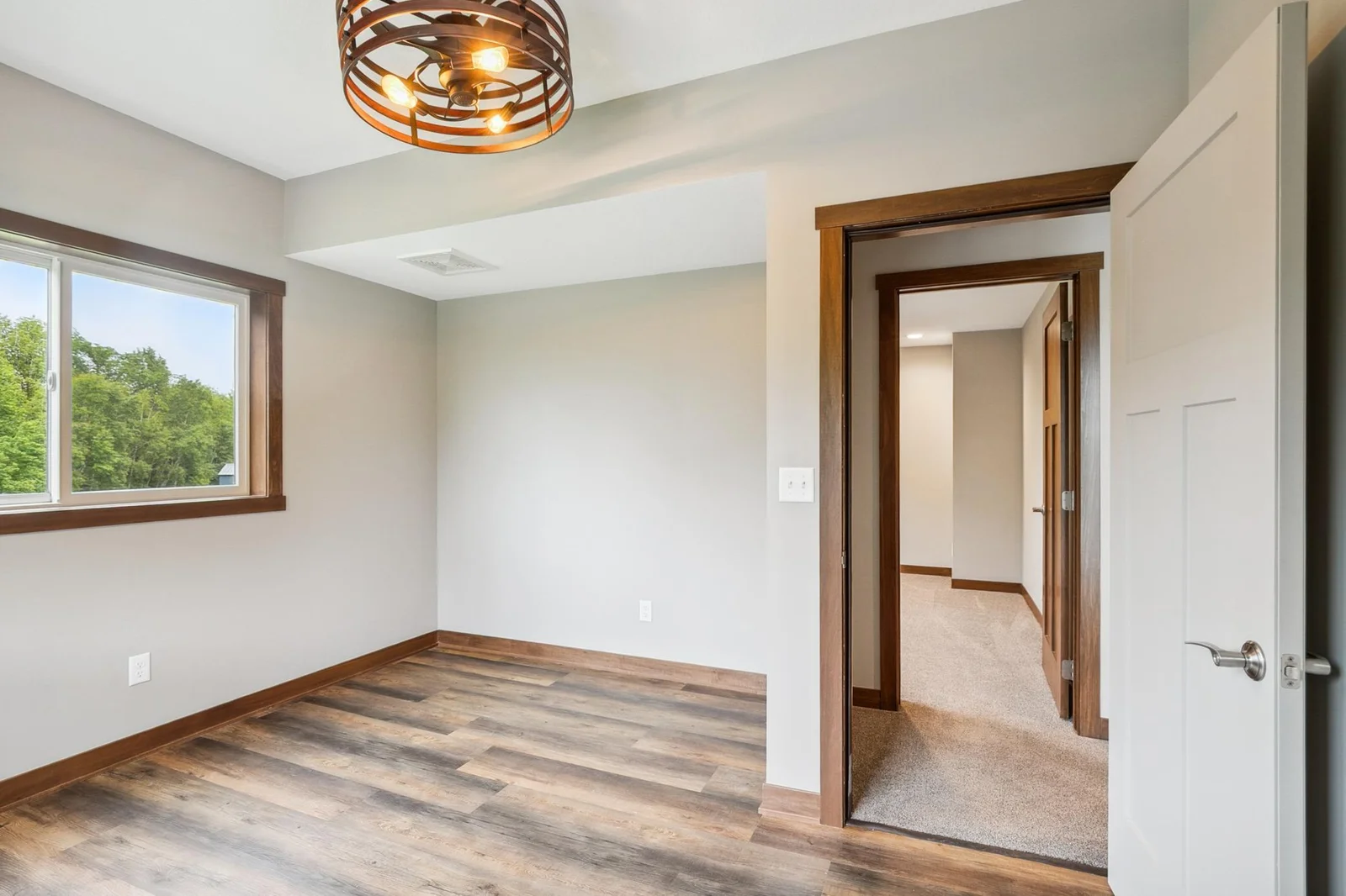 Lower-level bedrooms with plenty of room to relax or work from home.