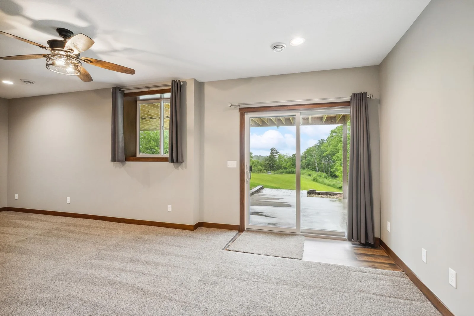 Bright walkout space that seamlessly connects indoor comfort with the outdoors.