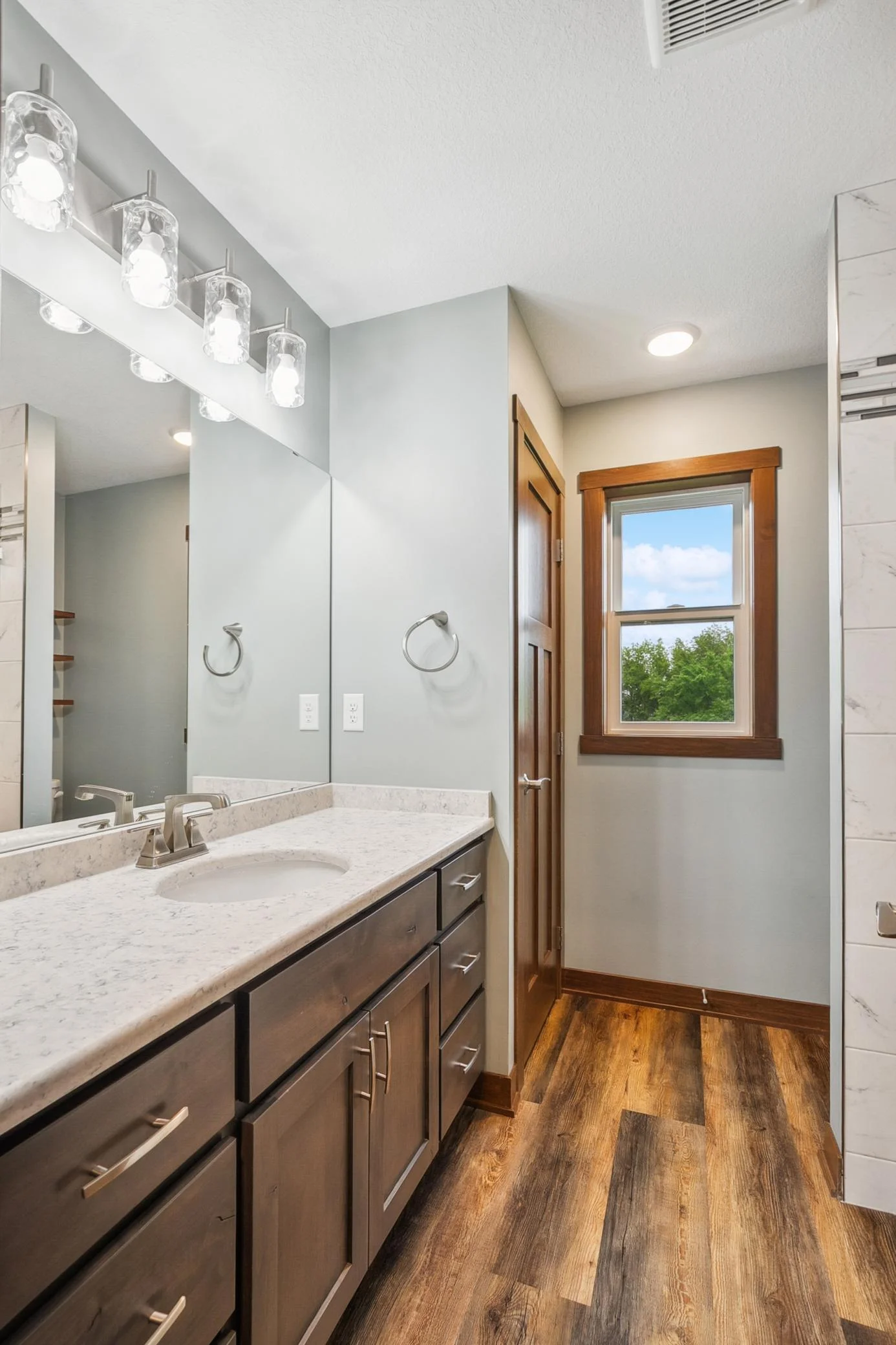 A serene space with high-end touches that elevate everyday routines.