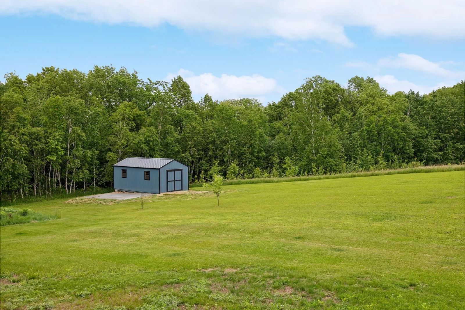 Custom-built 12x24 shed—perfect for storing your toys, tools, or even a classic car.