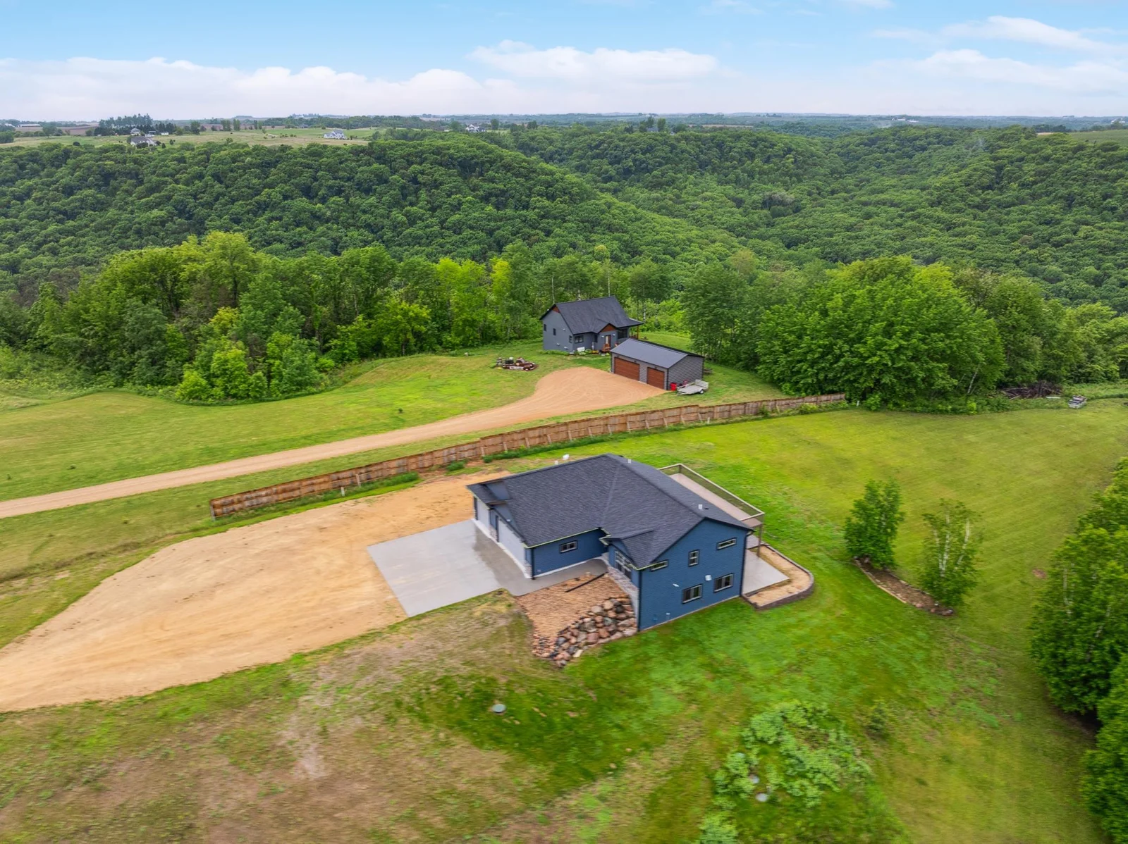 A rare birds eye view of one of Lake City's most exclusive bluff points, with panoramic sights in every direction.