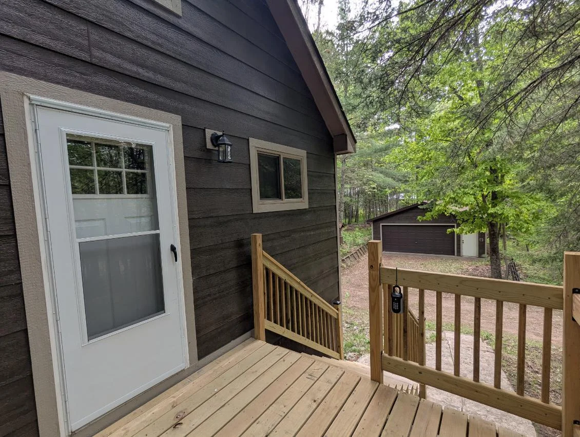 Roadside deck to garage view