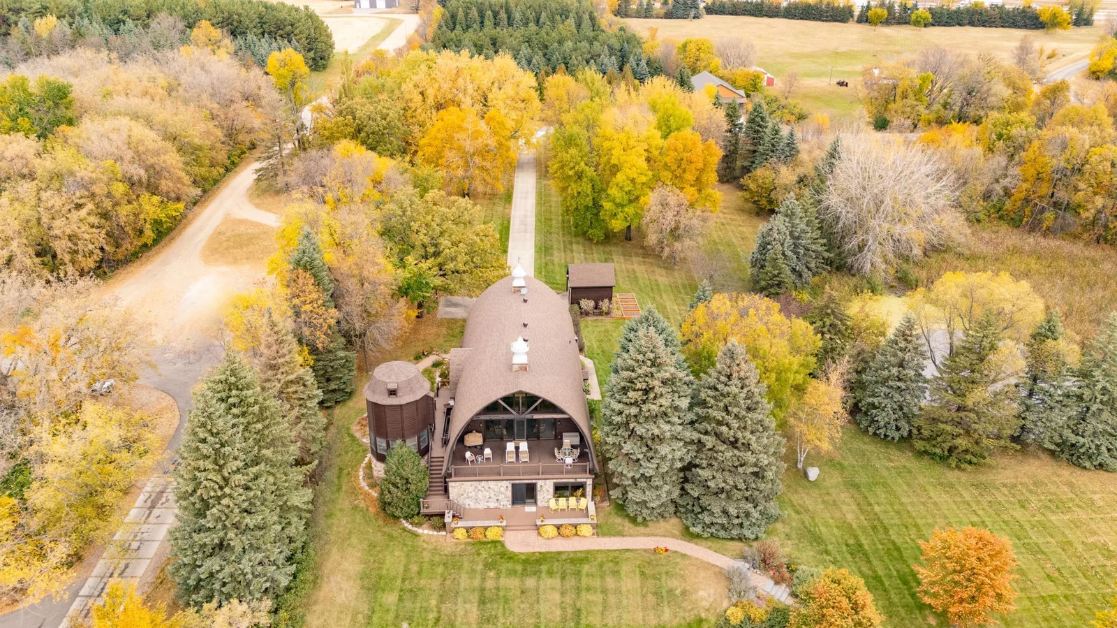 Manicured lawn meets natural beauty.