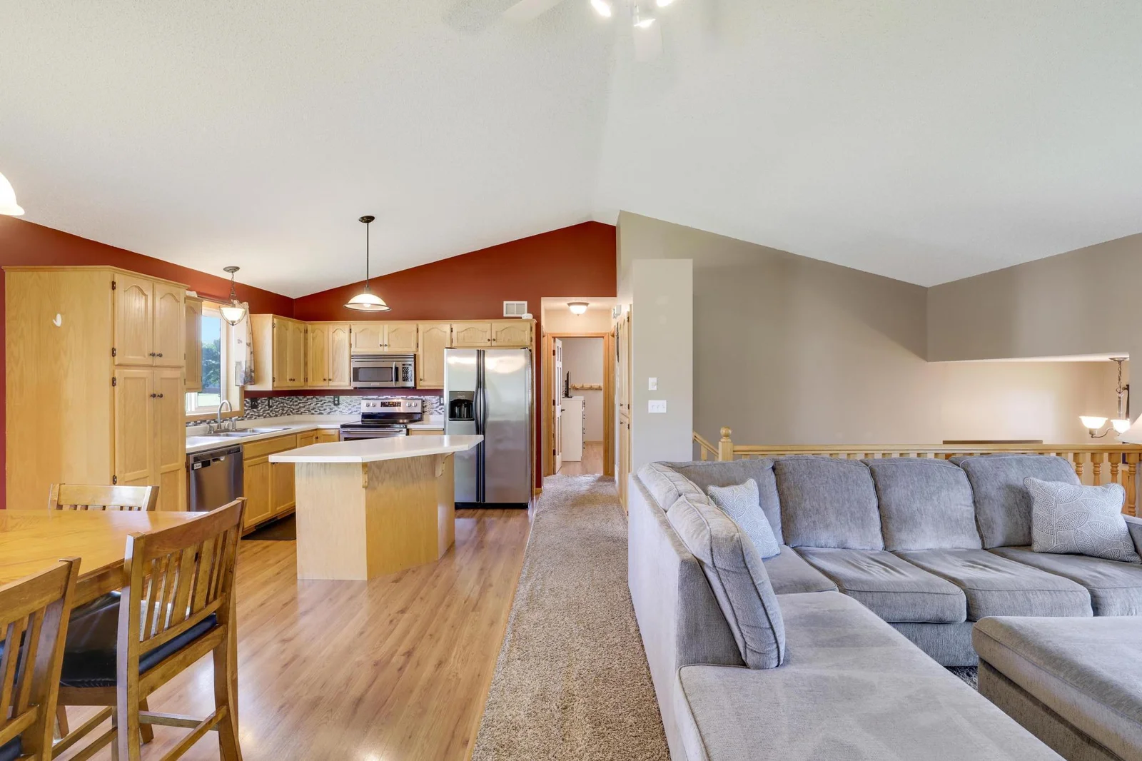Spacious, open concept design with vaulted ceilings