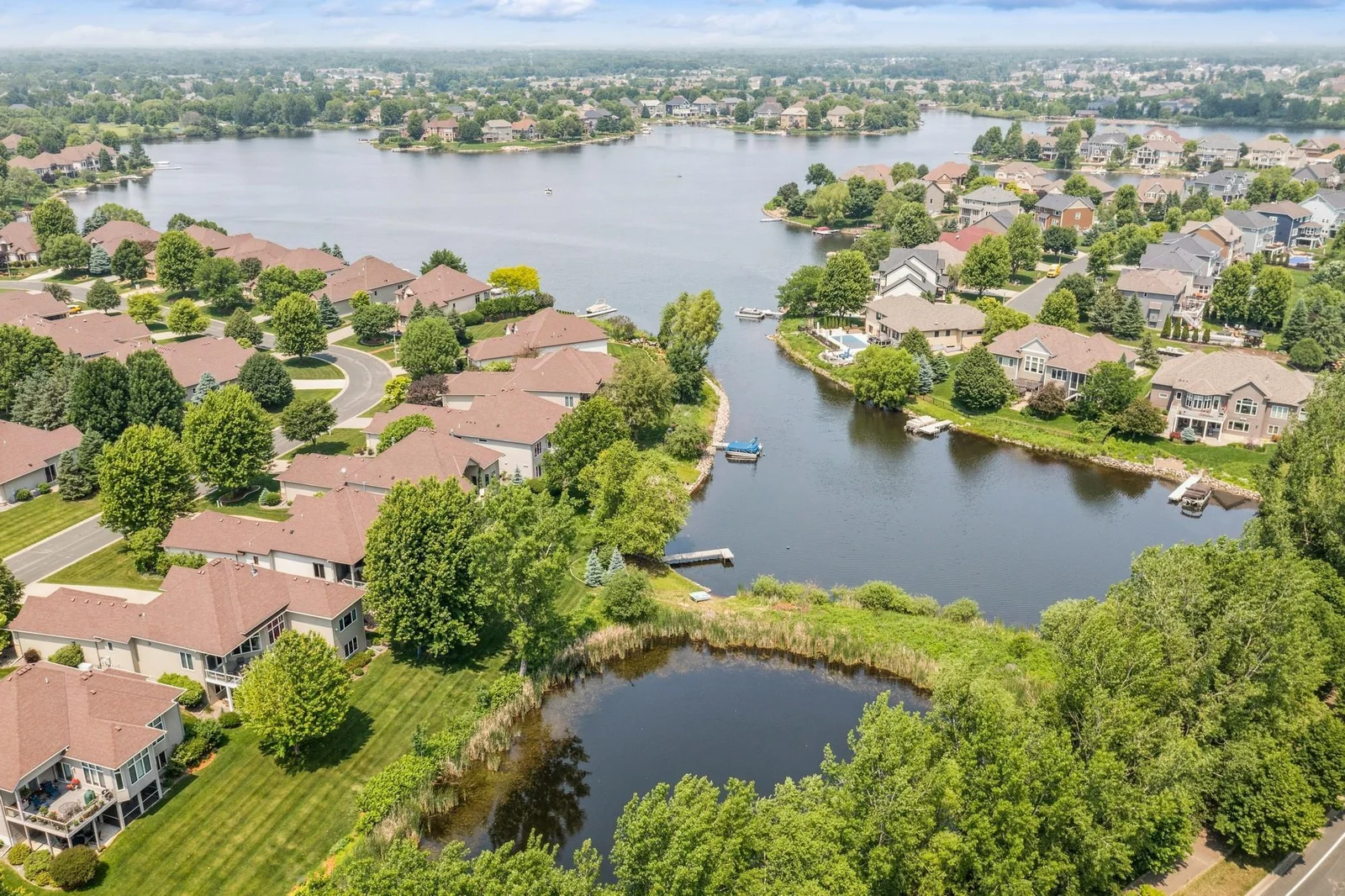 Direct access to the pond, public access to Sunrise Lake at the park at the end of Flanders
