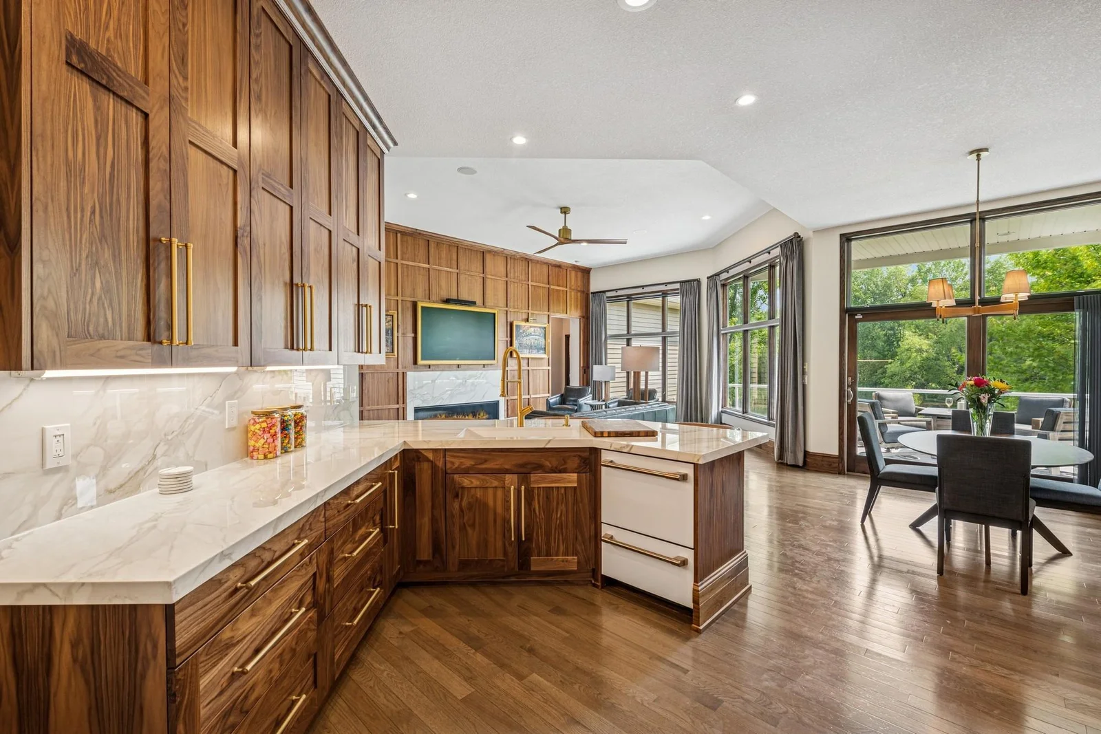 Walnut faced cabinets and soft close hinges
