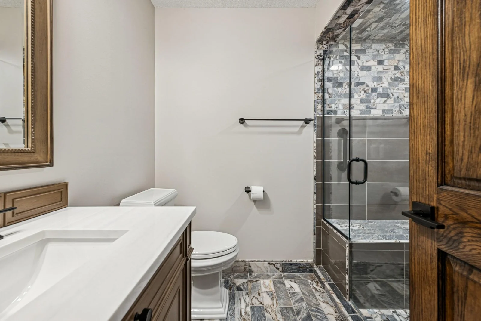 Lower level bathroom with updated shower