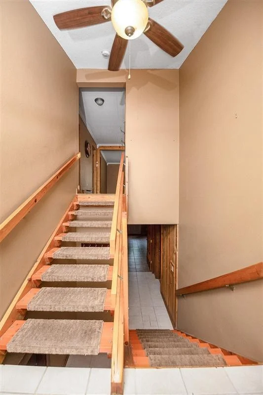 Staircase to upper and lower level