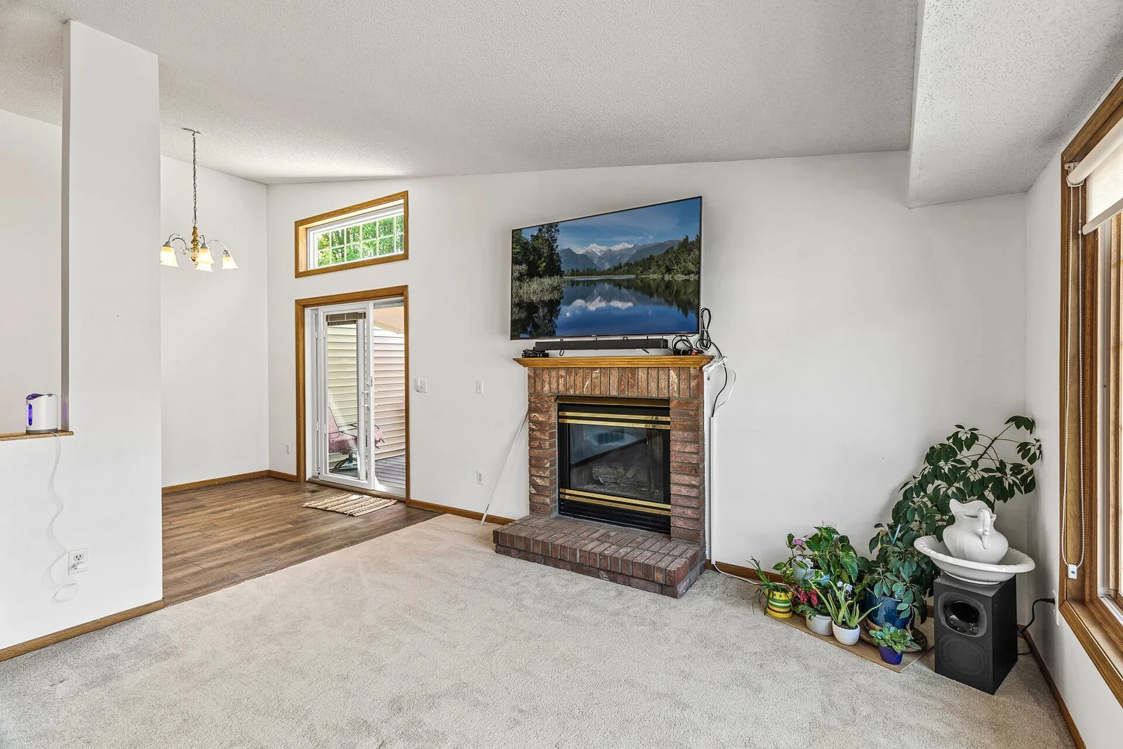 Upper level living room with gas fireplace