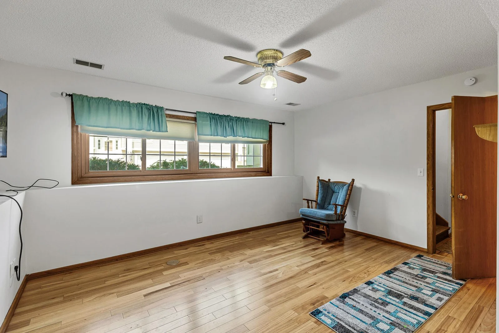 Lower level family room with lookout windows