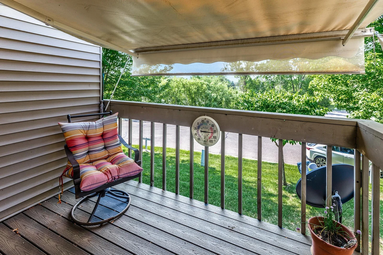 Upper level deck with retractable awning