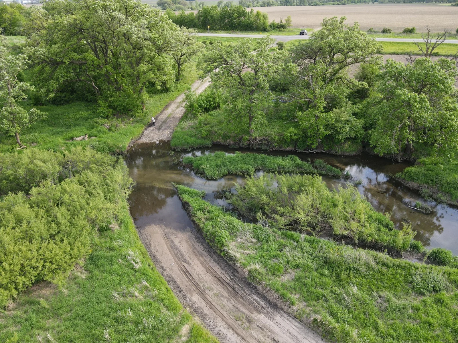 River crossing.  Rock bottom.  No problem driving a truck through it.