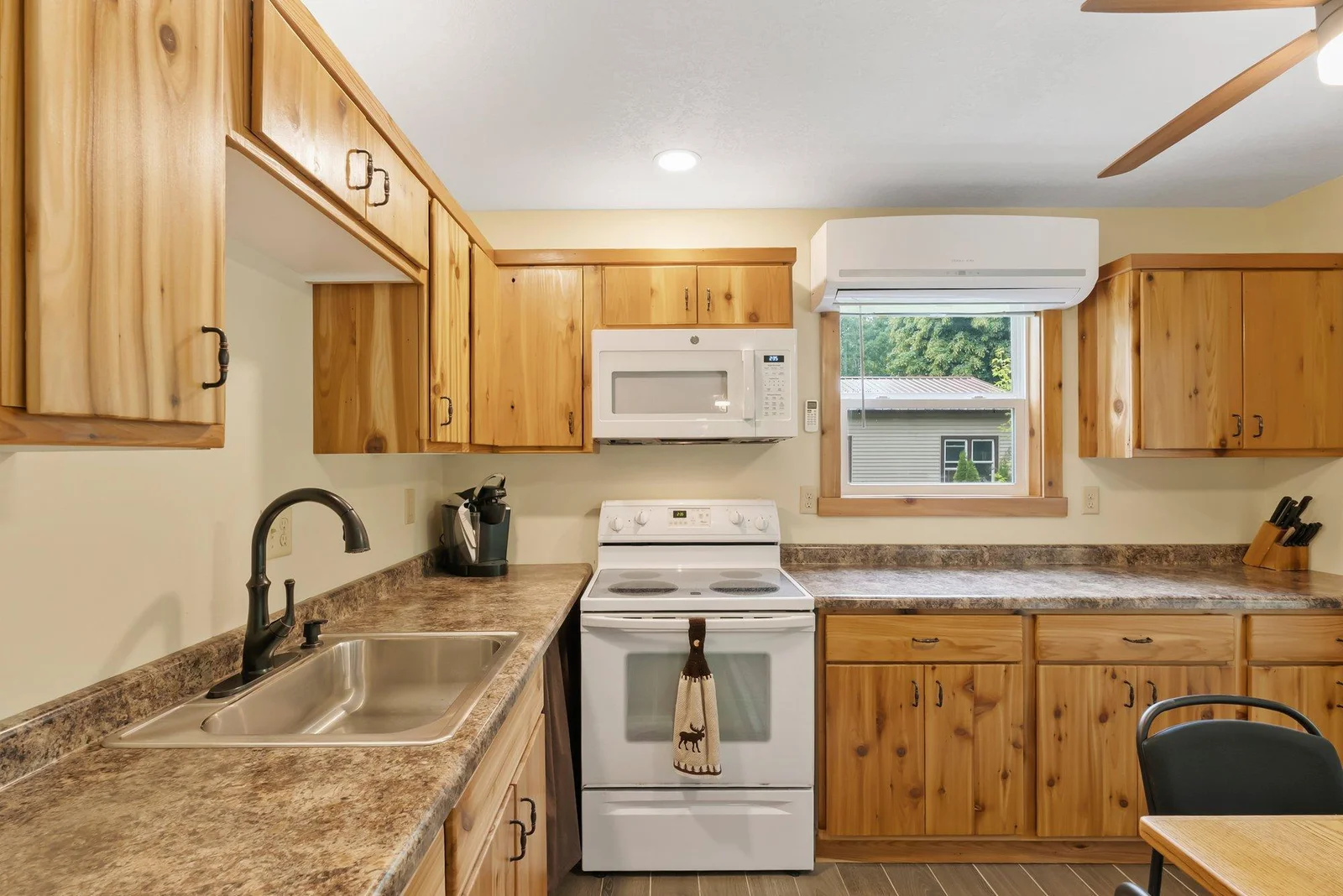 All appliances are included.  There is a mini split above the window for A/C and heating. All new sheet rocked walls, knock down ceilings, light fixtures and so much more!