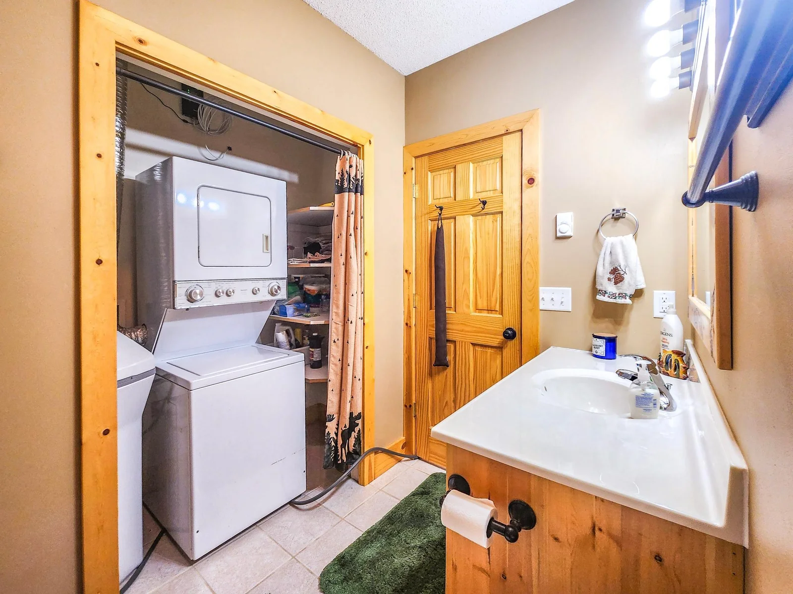 Stackable washer and dryer, water softner and well in bathroom closet, easy to keep warm in winter