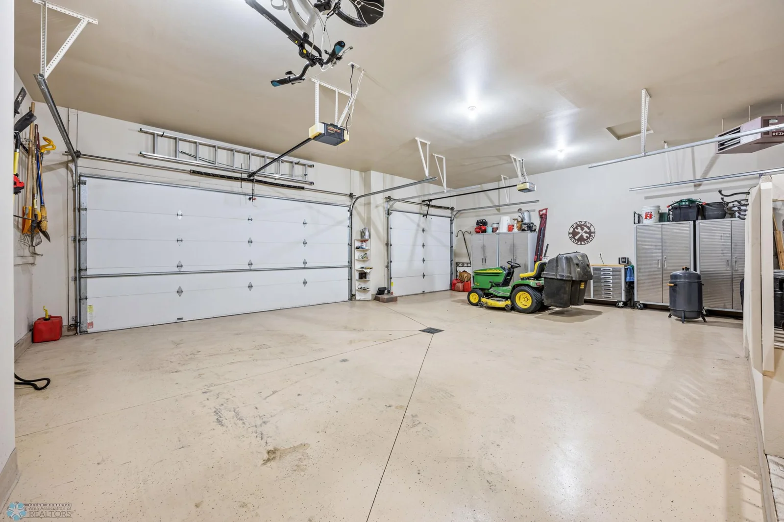 3 stall extra large heated garage with drain