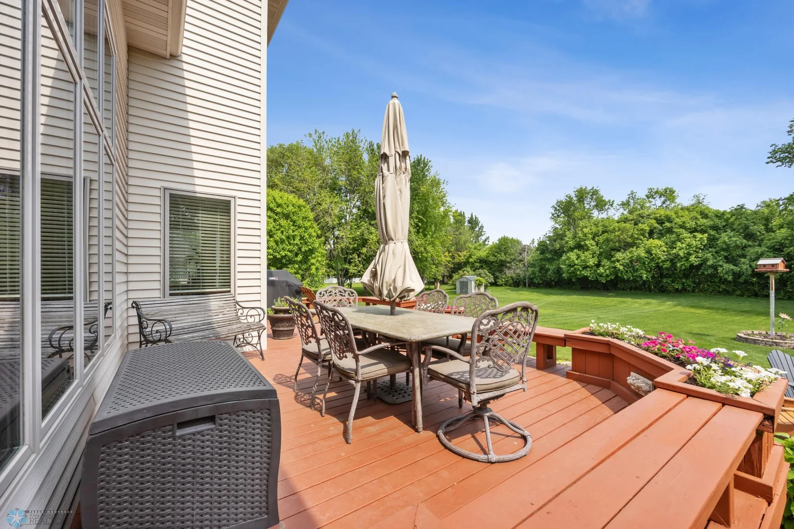 Large Deck with dining table and chairs