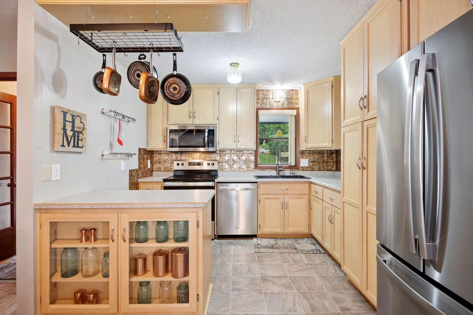 Newer Maple Cabinets and Stainless Appliances