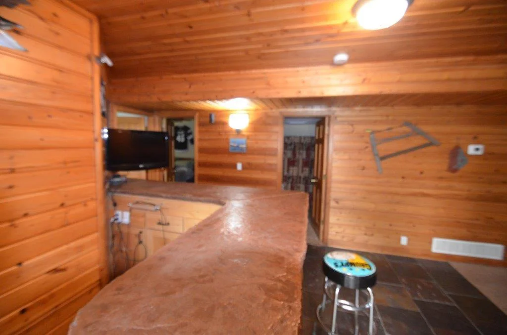 Bar area adjacent to family room perfect for entertaining.