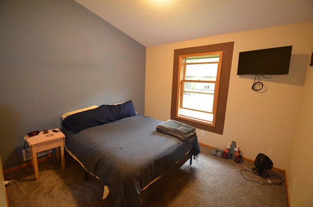 One of 2 main floor bedrooms