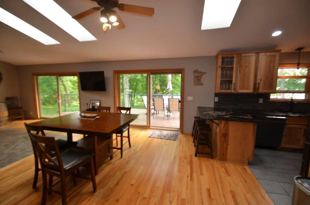 Two sliding door make easy access to the deck and provides lots of natural light.