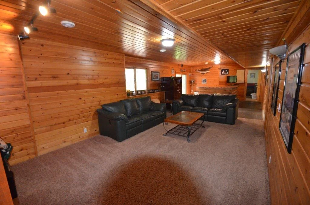 Lower level family room with beautiful T&G walls and ceiling