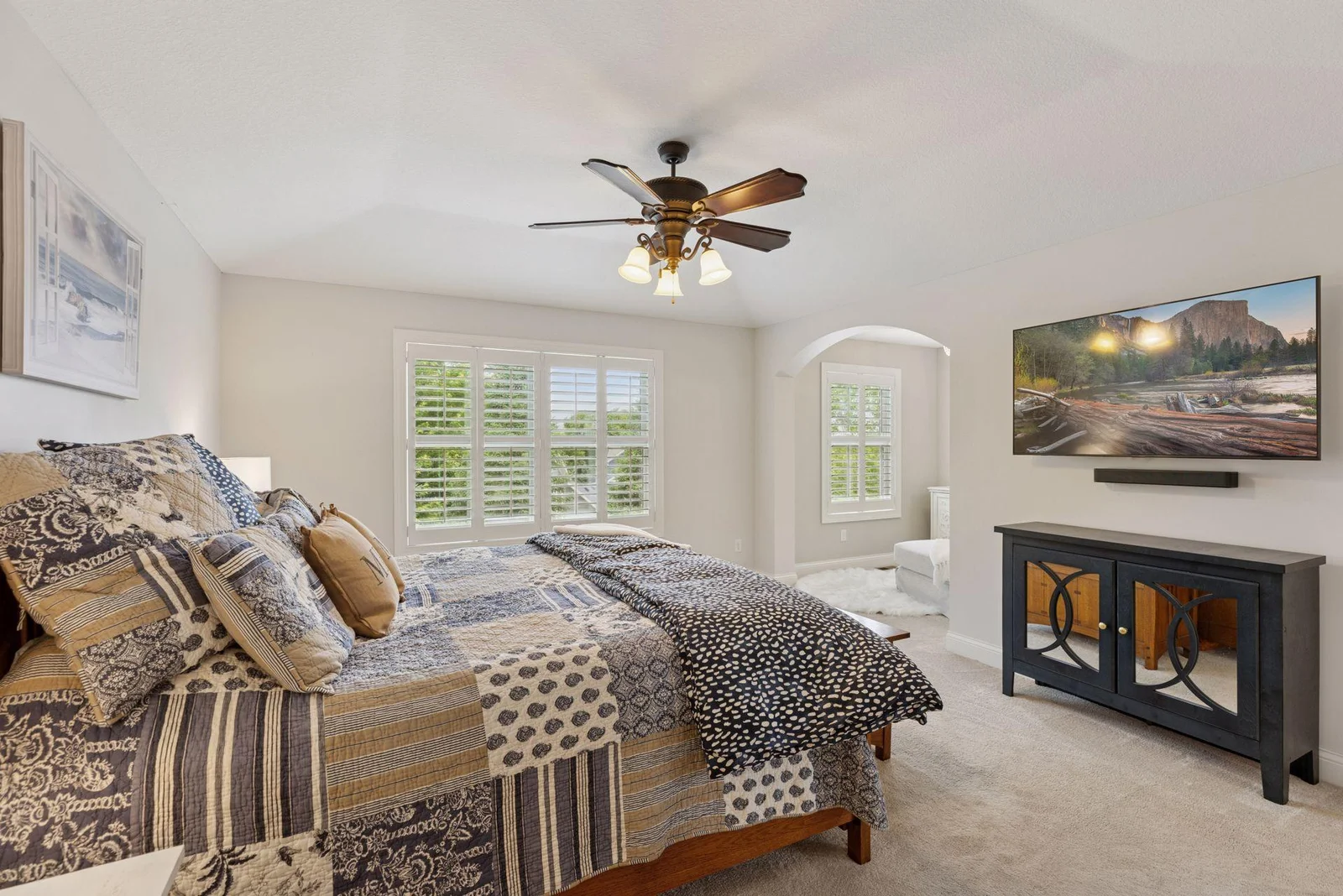 The large primary suite is a peaceful retreat, offering plenty of space to unwind and recharge. A cozy reading nook adds charm and comfort—perfect for quiet mornings or winding down at the end of the day.