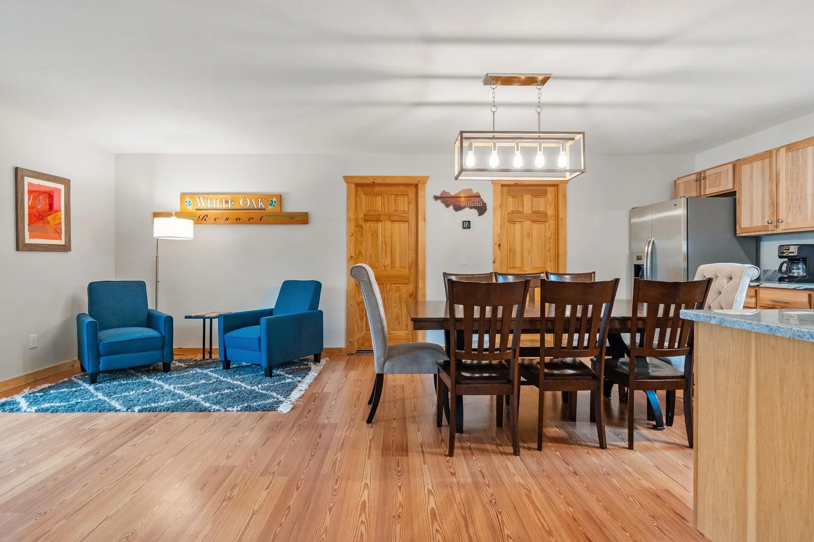 An inviting kitchen and cozy lounging space create the perfect spot for cooking and relaxing.