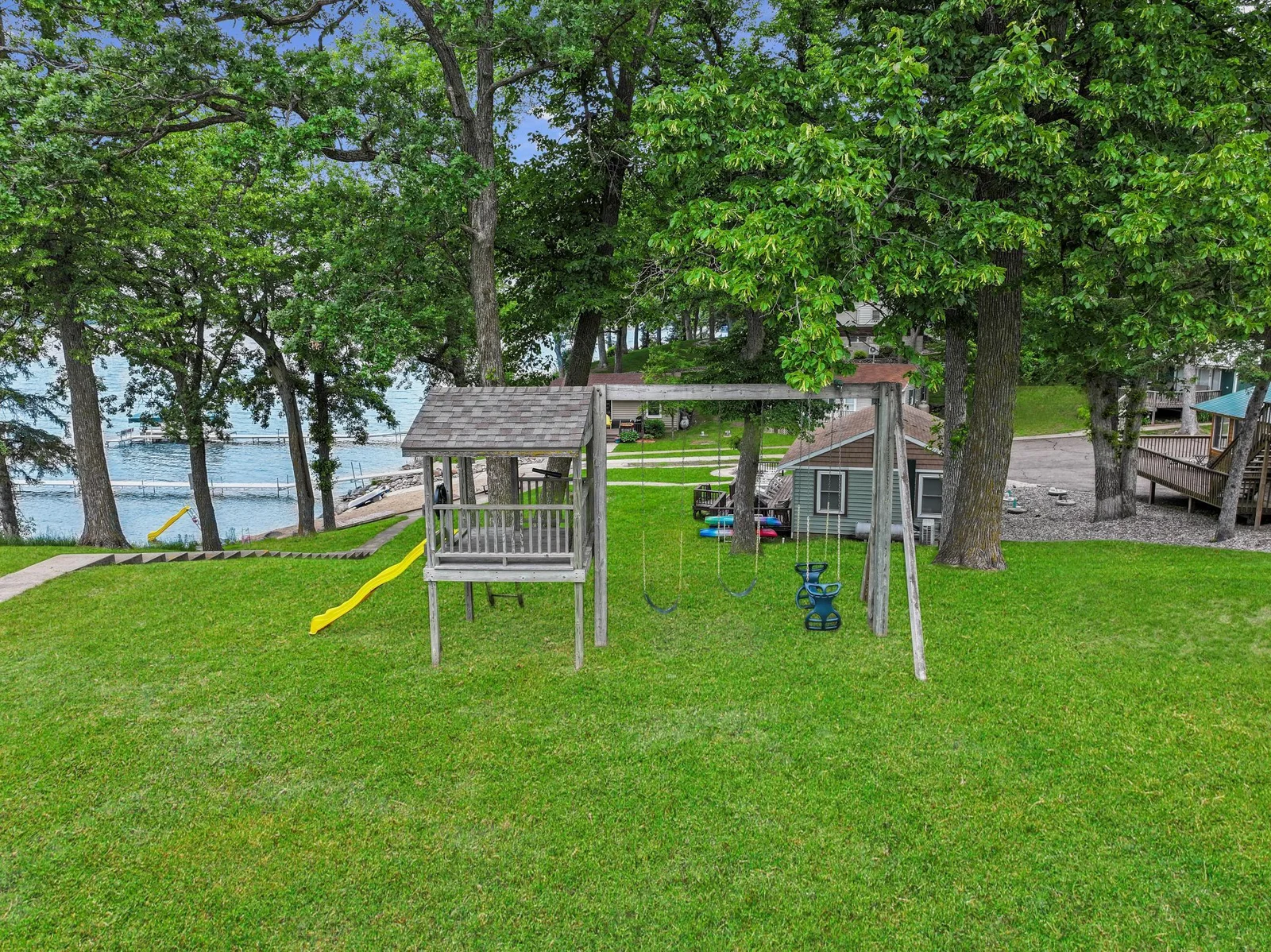 Kids will love spending time on the shared playset, perfect for endless outdoor fun.