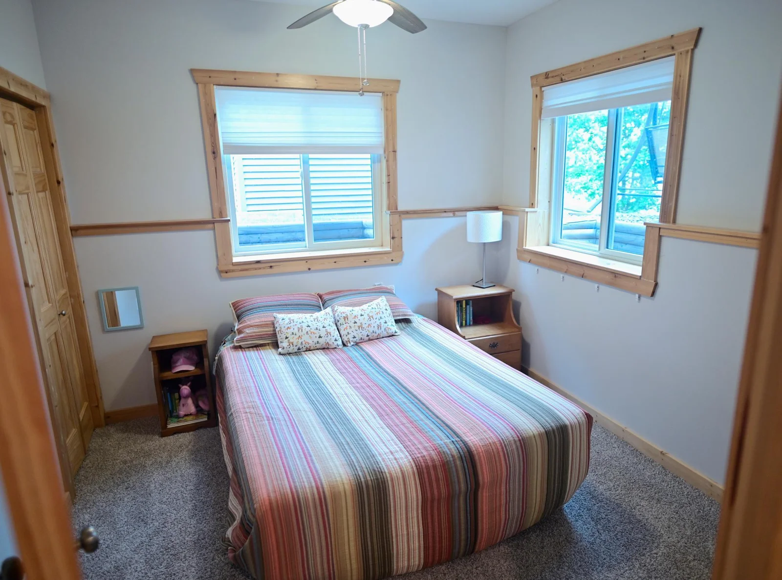Sunlight streams into the bedrooms, enhancing their bright and airy atmosphere.