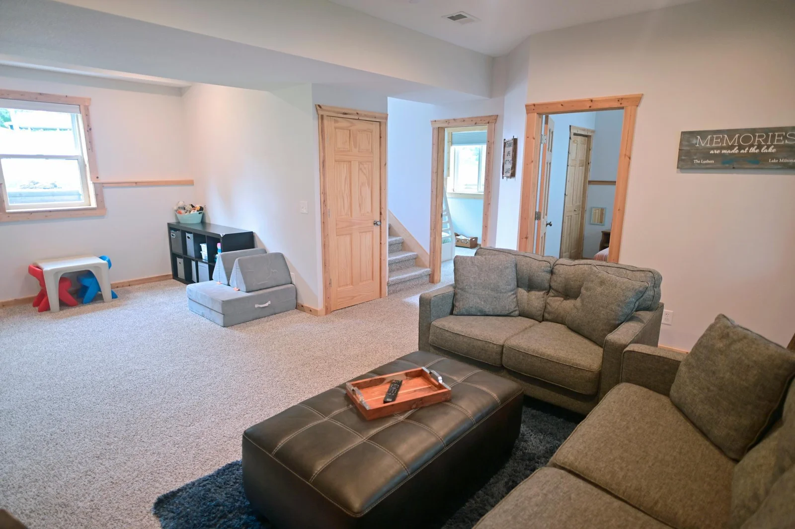 The basement features impressive 9-foot ceilings, creating a bright, open space that feels anything but underground.