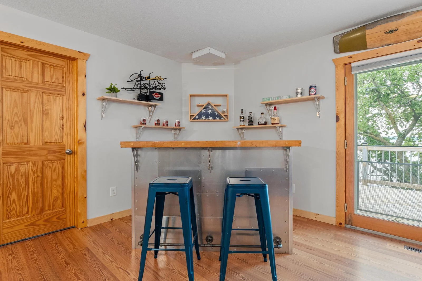 Savor the stylish bar area perfectly situated right off the kitchen.