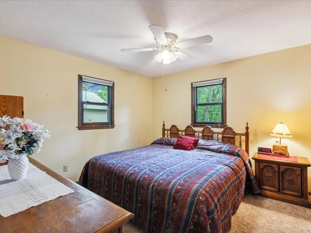 Second large bedroom on main level, large enough for king size bed or a set of bunk beds.