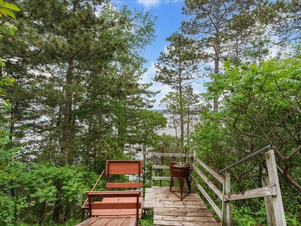 Just steps from the home, the lift makes every trip to the lake shore easy and picturesque