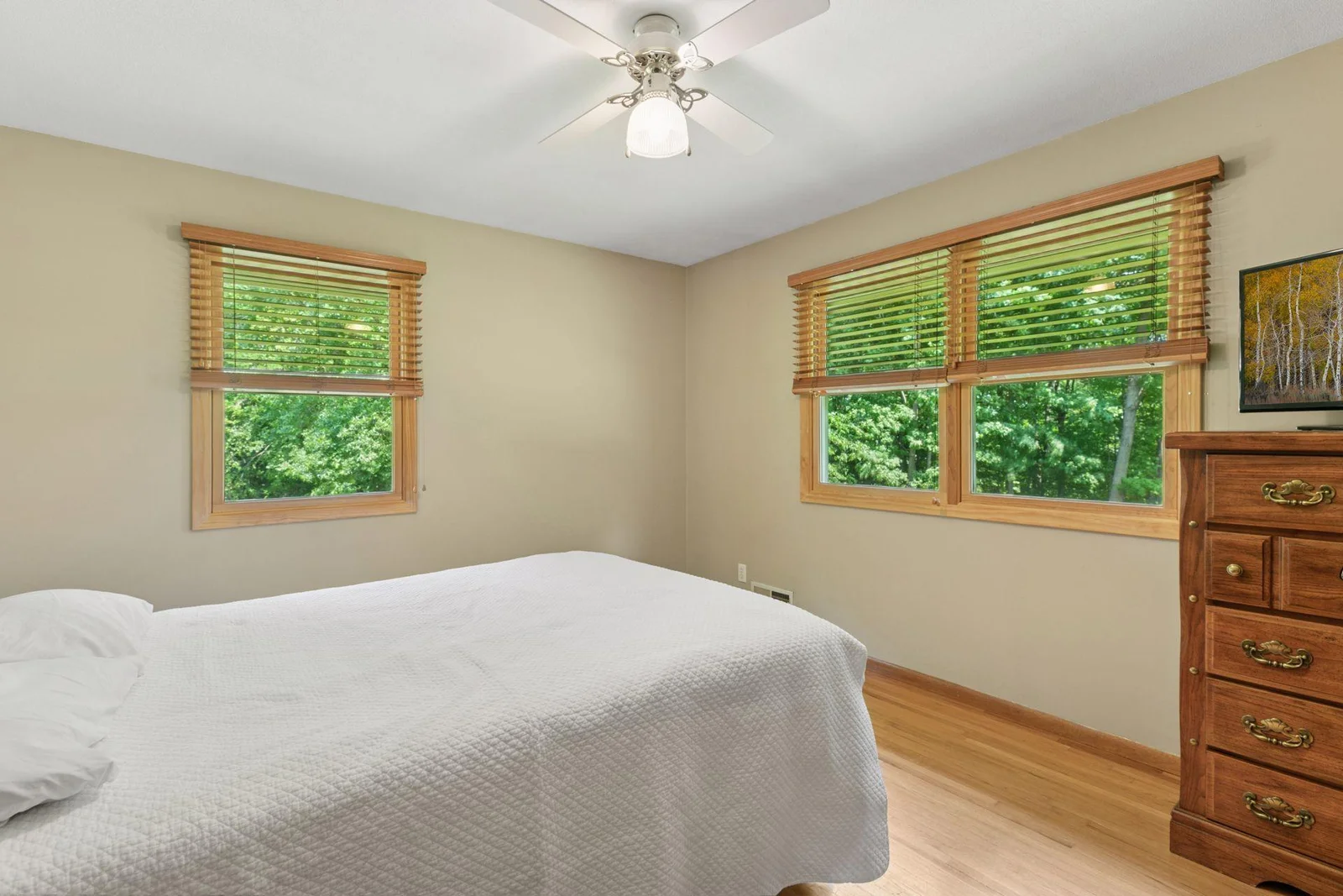 Primary bedroom overlooks the backyard