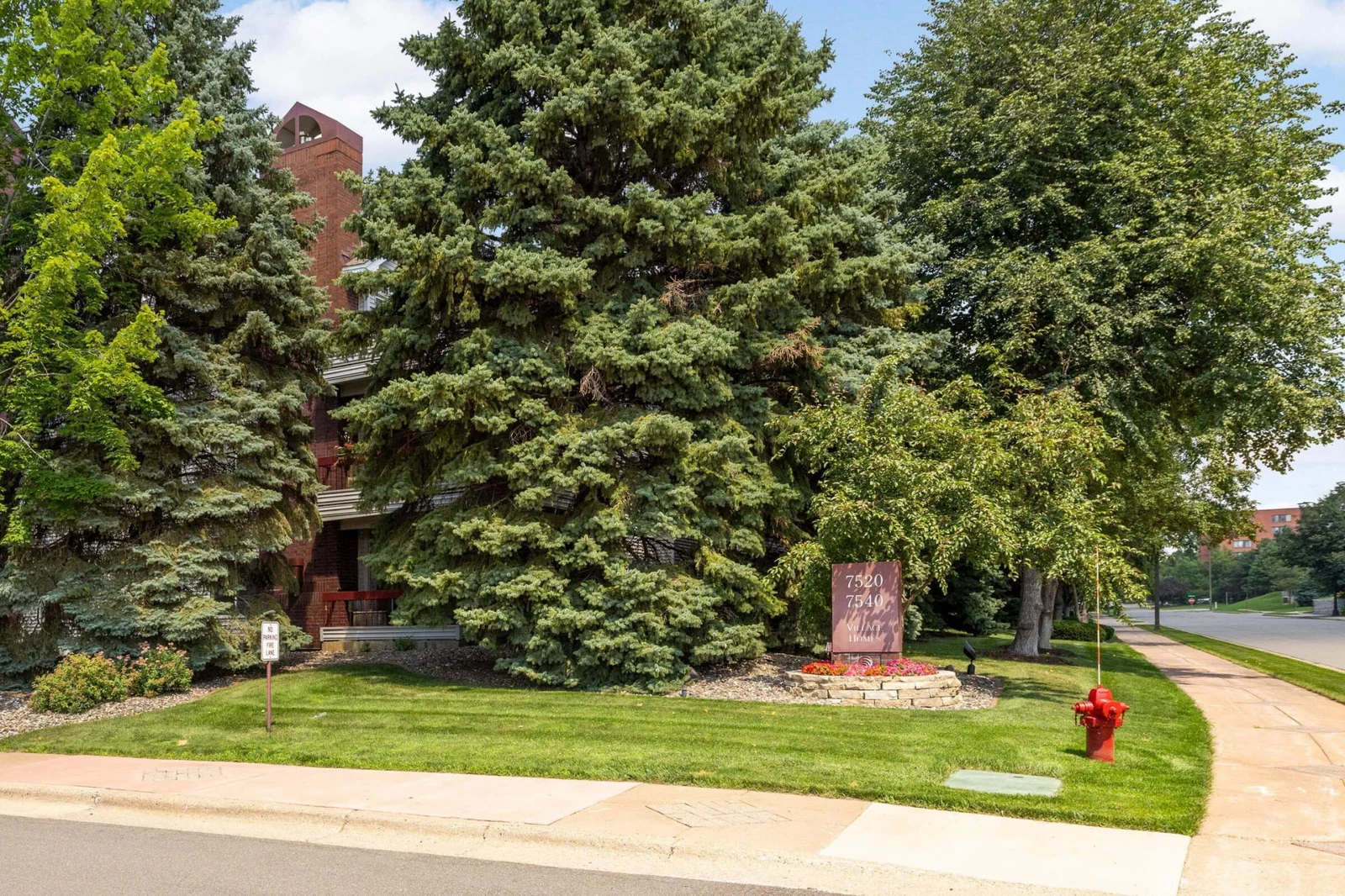 Mature trees and lovely cared-for spaces make this condo special