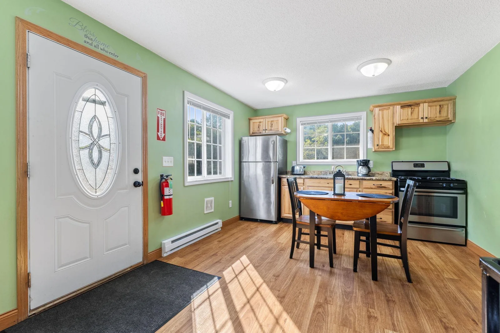 Entrance and one of the kitchen areas in the 7 bedroom home.