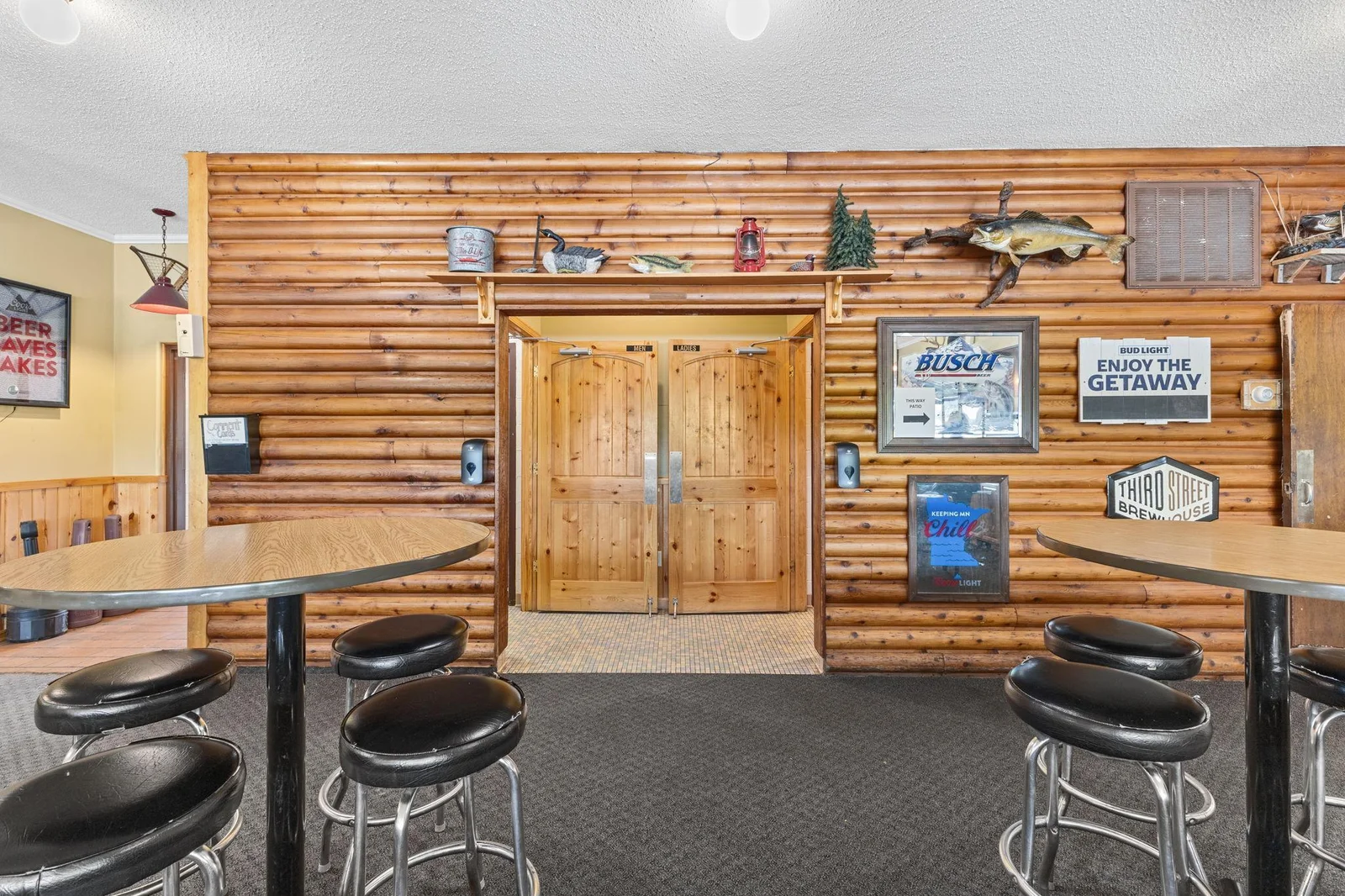 The log decor is a great addition......all furniture, fixtures and equipment are included with the building.