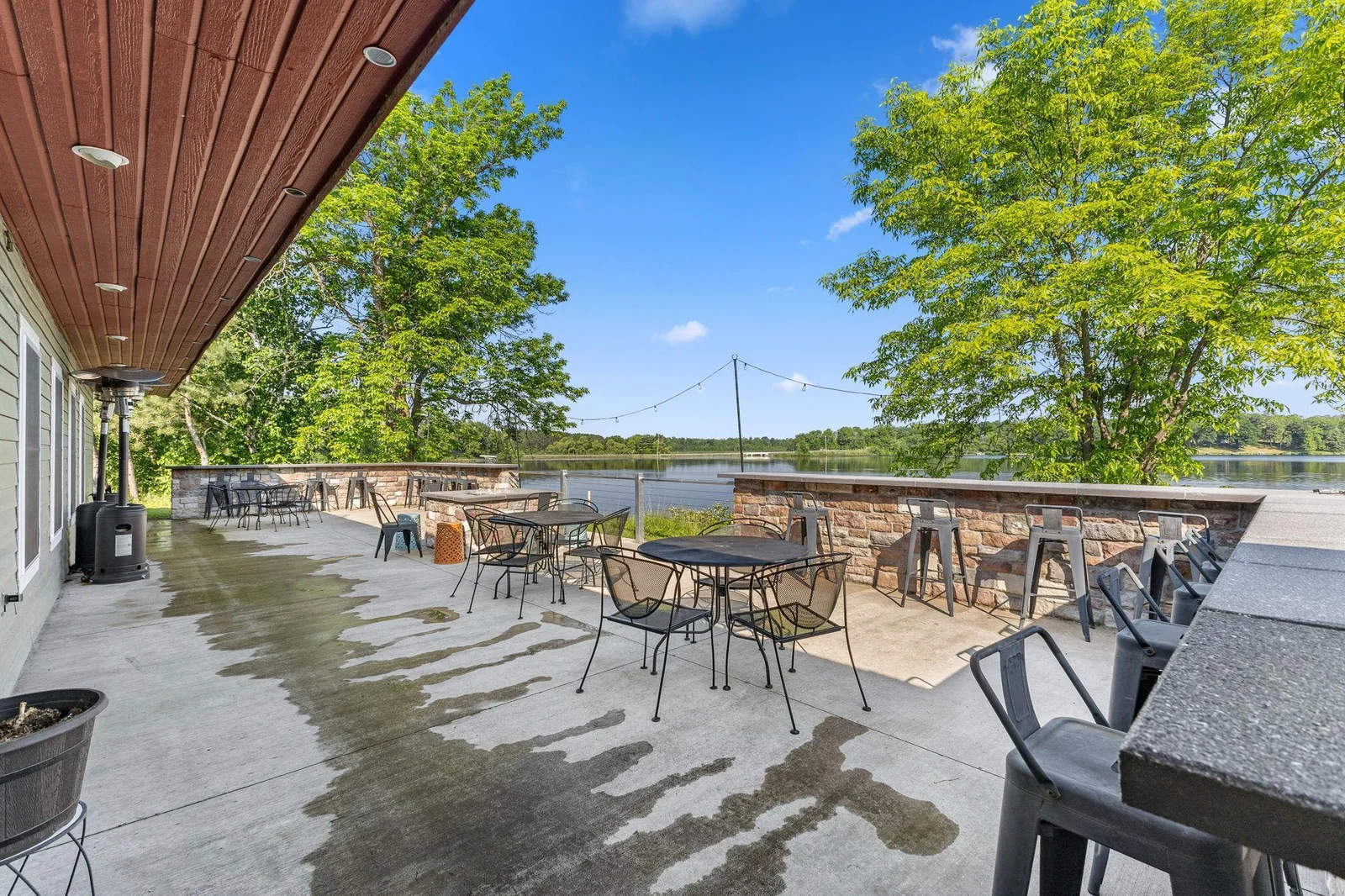 Closer view of the patio.  High top seating all around the edge that allows fantastic views of the lake.