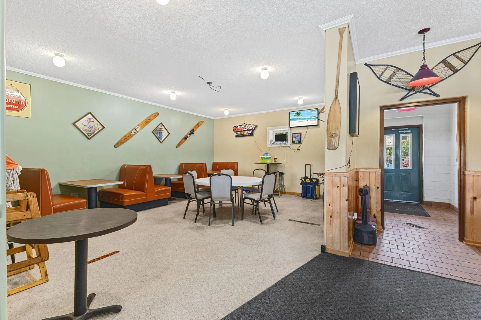 This room could easily be used as additional seating space or use it as a game room.
