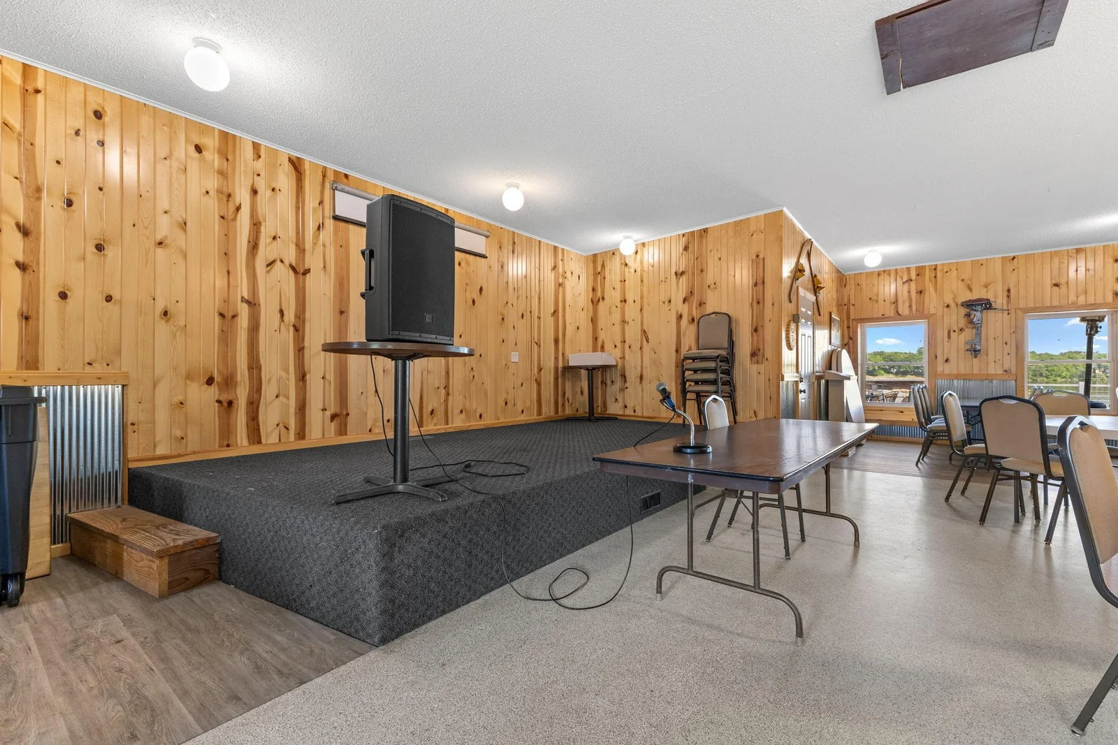 Has a stage area on one end.