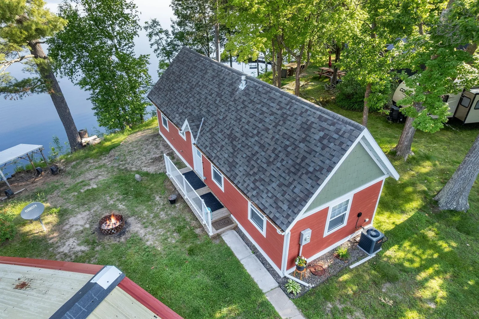 Newer roof...........this home sits so close to the water and provides fantastic view of the lake.  The entire home has been update recently.