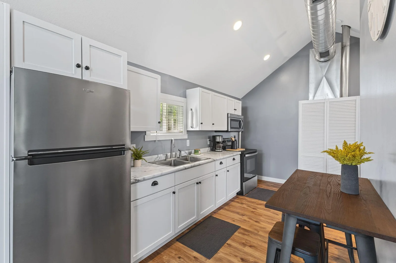 Kitchen area with stainless steel appliances.
