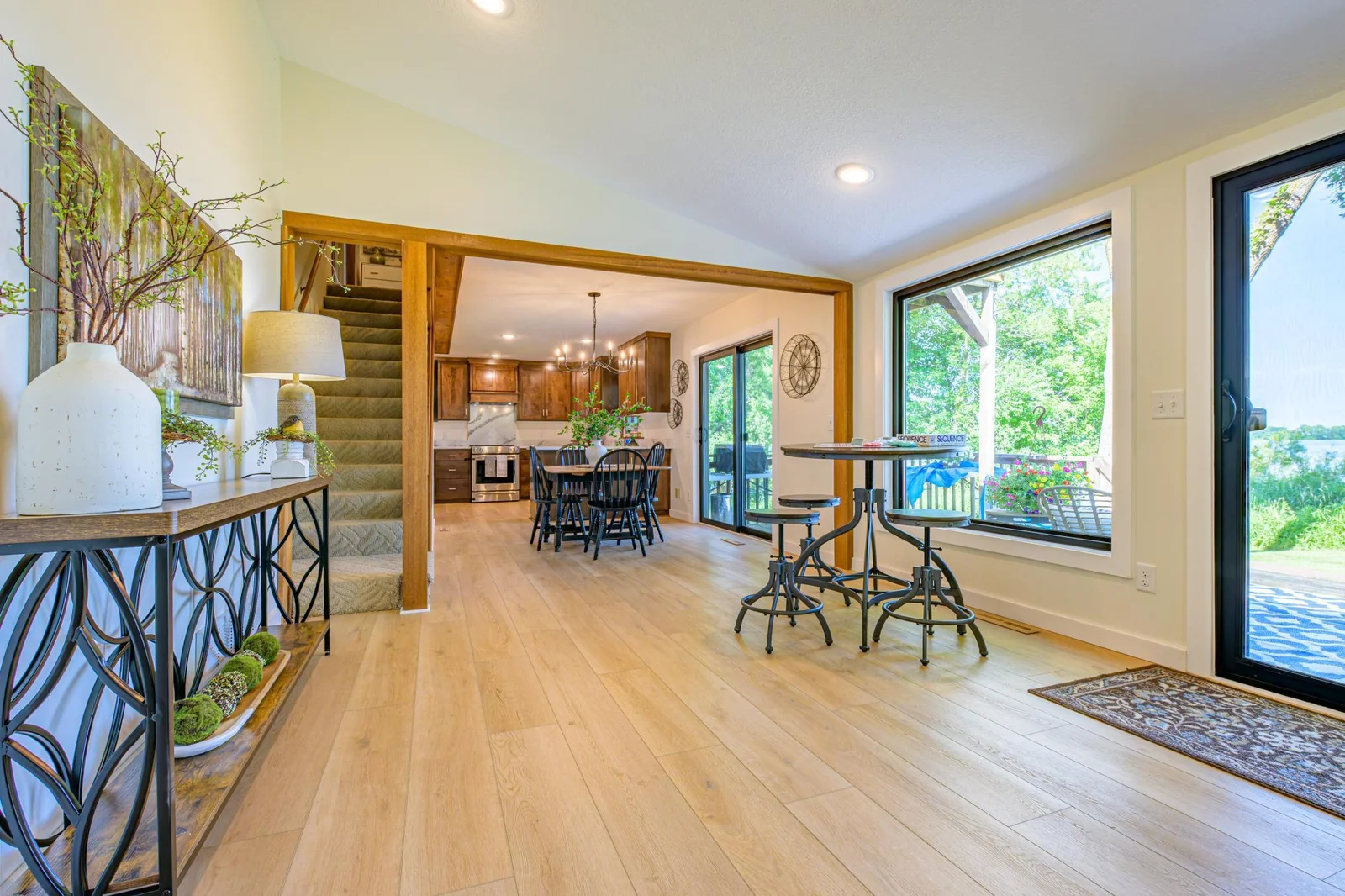 The open concept main floor features LVP flooring.